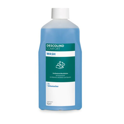 Fľaša s objemom 1 liter Dr. Schumacher Waschlotion DESCOLIND COMFORT WASH od Dr. Schumacher GmbH s bielym uzáverom a modrou tekutinou poukazuje na bielo-zelenom prednom štítku okrem údajov o produkte na pH-neutrálnu formulu a alantoín.