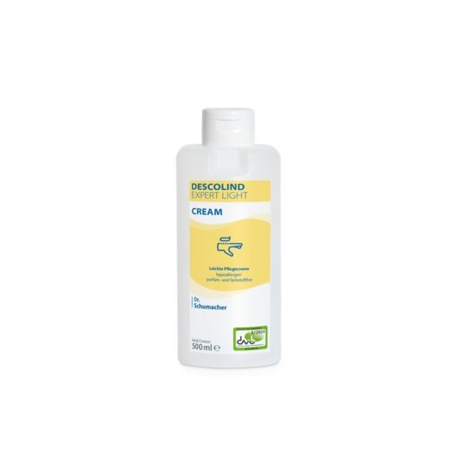 Biela 500-ml fľaša Dr. Schumacher DESCOLIND EXPERT LIGHT CREAM krém na ruky od Dr. Schumacher GmbH, so žltou etiketou s informáciami o produkte v nemeckom jazyku, zeleným logom vpravo dole a upozornením na starostlivosť o citlivú pokožku.