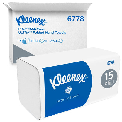 Balenie bielych skladacích vreckoviek Kleenex®/Veľké balenie od Kimberly-Clark GmbH stojí pred značkovou zásielkovou škatuľou, obe s 15 klipmi x 124 hárkov na škatuľu (15 balení), celkovo 1 860 vreckoviek.