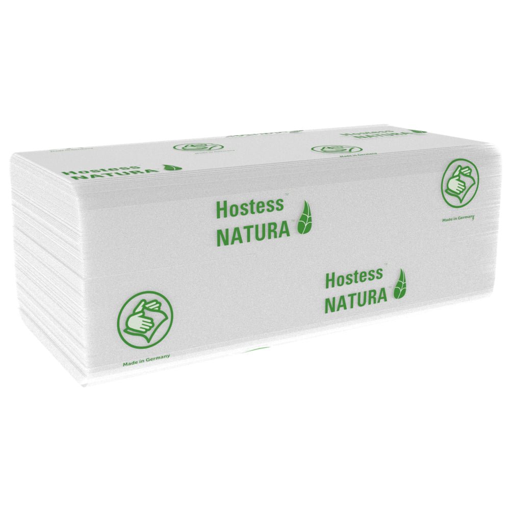 Stoh bielych, zložených uterákov Hostess™ NATURA™ (Kimberly-Clark GmbH), veľké, 20 x 84 listov, so zeleným brandingom a symbolom palca hore. Vyrobené v Nemecku - ideálne papierové uteráky pre verejné priestory. 20 balení na kartón.