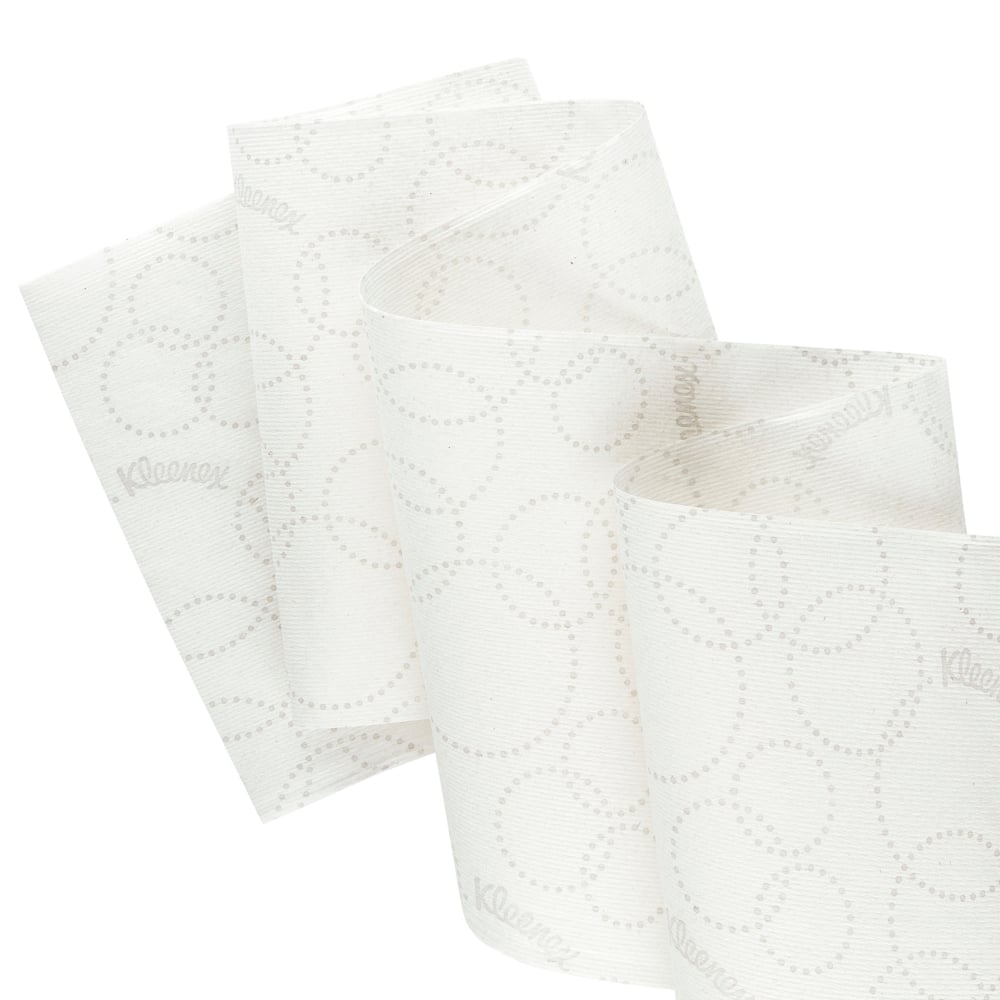 Časť Kleenex® Ultra™ rolkových utierok, 2-vrstvová, biela s jemne bodkovanými kruhmi a "Kleenex"-logom, od Kimberly-Clark GmbH, zobrazená ako hygienické riešenie utierky. Balenie: 6x200m roliek na kartón.