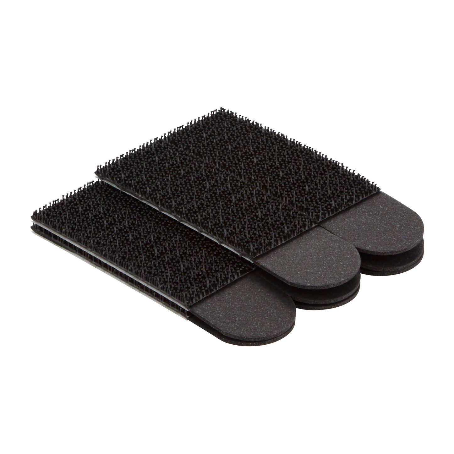 Drei schwarze rechteckige Bürsten-Reinigungspads mit strukturierten Borsten, gestapelt auf weißem Hintergrund - perfekt für die Verwendung mit 3M Deutschland GmbH Command™ Bilder-Montage Strips 17201BLK, Mittelgroße, Schwarz (4 Sets) zum Aufhängen von Bildern ohne Nägel und einfaches Entfernen.