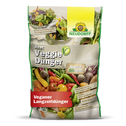 Azet VeggieDünger od Neudorff Shop je organické a vegánske hnojivo. Balenie zobrazuje rôzne druhy zeleniny so zelenými, žltými a červenými nemeckými etiketami, ktoré zvýrazňujú detaily produktu.