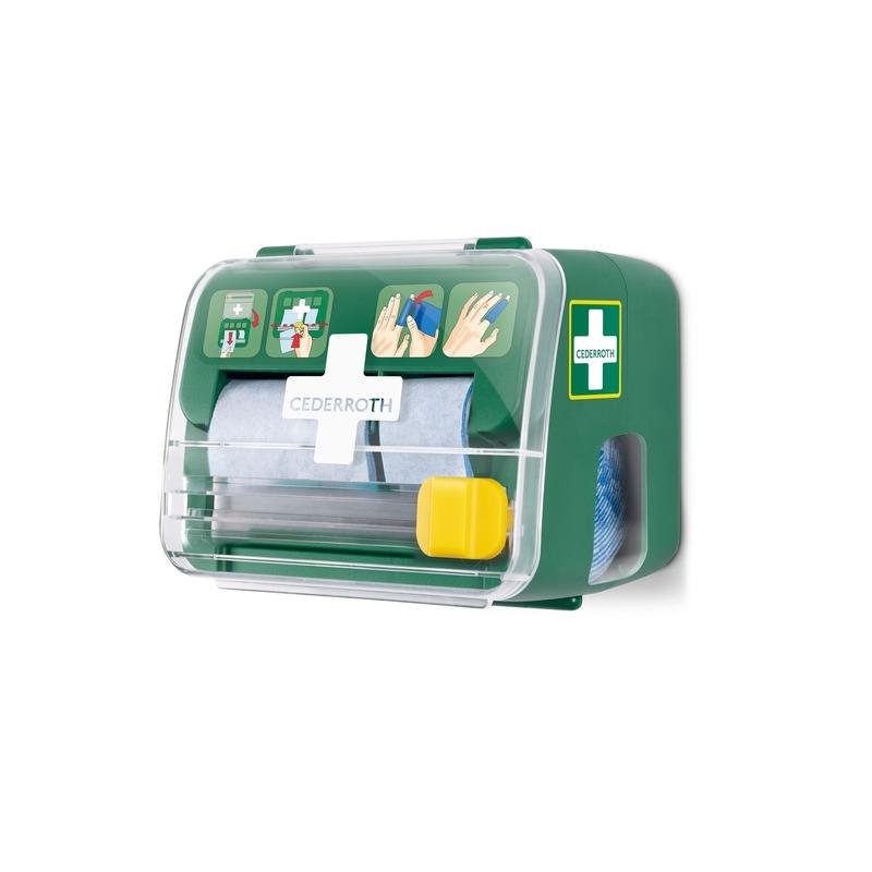 Zelený, priehľadný Cederroth penový obväz 2-v-1 dávkovač od Orkla Wound Care AB je namontovaný na bielej stene, obsahuje zabalený materiál a na prednej strane zobrazuje ilustrovaný návod na prvú pomoc.