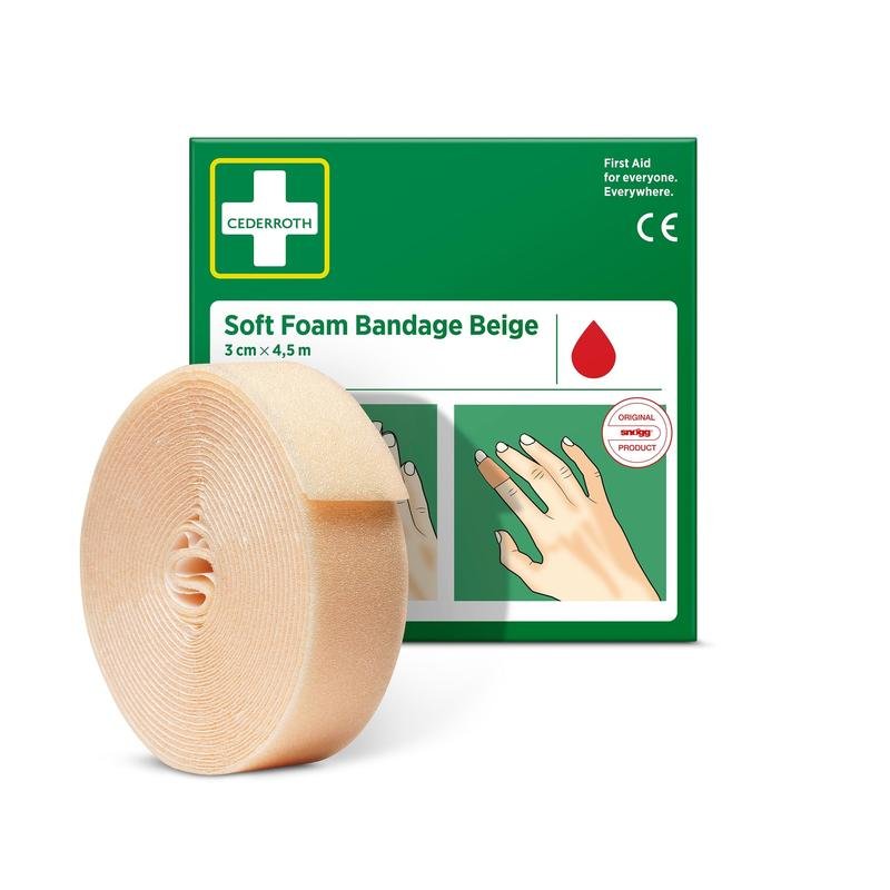 Béžový Cederroth mäkký penový obväz (3x450cm, 1 kus) od Orkla Wound Care AB stojí pred svojou zeleno-bielou škatuľou s ilustrovaným návodom na použitie.