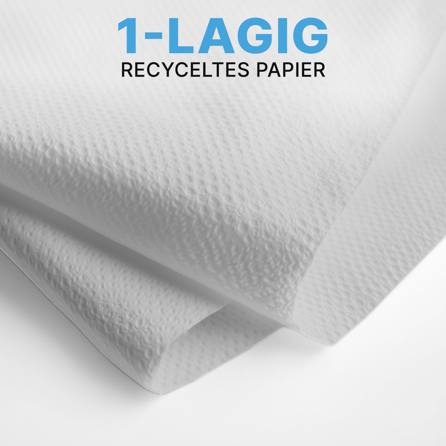 Detailný záber dvoch bielych ARNOMED PAPIEROVÝCH UTIEROK (25 x 23 cm, V-SKLAD) od ARNOWA GmbH so štruktúrovaným povrchom, uložených v V-sklade. Modro-čierny text znie "1-VRSTVOVÝ RECYKLOVANÝ PAPIER" - ideálne pre umyvárne.