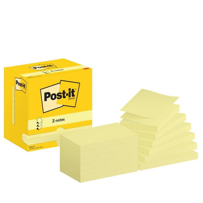 Žltá škatuľka s nápisom "Post-it® Super Sticky Z-Notes Promotion, 76 mm x 127 mm, 100 listov/blok, kartónové balenie, 100% PEFC" od 3M Deutschland GmbH je zobrazená vedľa dvoch nerovnomerných stohov žltých Z-Notes s vystúpenými obalmi na bielom pozadí.
