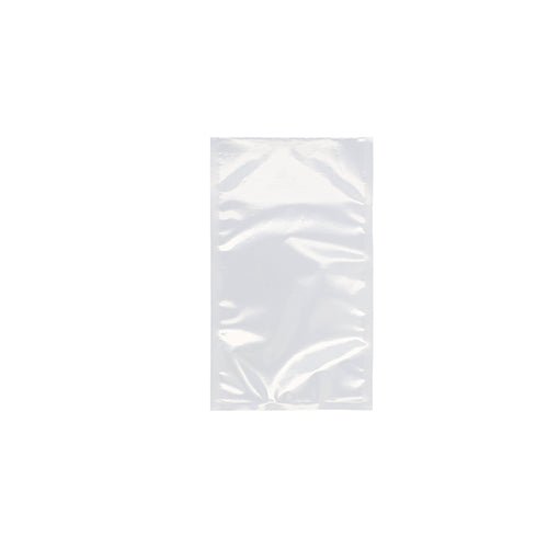 Starpak 100 Siegelrandbeutel, PA/PE transparentný od Starpak leží naplocho na bielom pozadí. Priehľadný plastový sáčok ukazuje mierne záhyby a odrazy, perfektný pre skladovanie potravín s komorovým vákuovačom.
