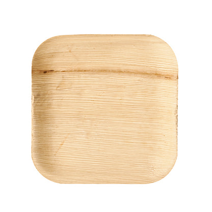 Tanier PAPSTAR 25 z palmového listu „pure“ od PAPSTAR GmbH je štvorcový, plochý, svetlohnedý tanier z palmového listu s oblými rohmi a viditeľnou textúrou – ekologická voľba na špeciálne príležitosti, zobrazené na bielom pozadí.