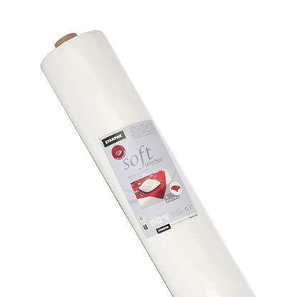 Zobrazená je veľká rolka Starpak obrus, podobný látke, rúno „soft selection“ (25 m x 1,18 m, biela) s etiketou s vankúšovým symbolom a detailmi produktu, fotografovaná pred jednoduchým bielym pozadím.