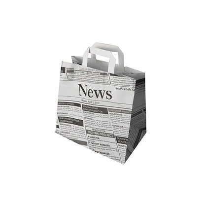 50 tašiek PAPSTAR GmbH sú ekologické papierové tašky s rúčkami, ktoré zobrazujú čierno-biely novinový motív s titulkami a článkami na bielom pozadí.