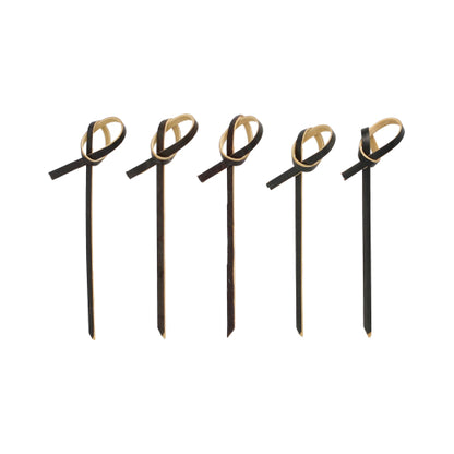 Päť PAPSTAR 250 Fingerfood - špáradiel od PAPSTAR GmbH v čiernej farbe so svetlohnedými stužkovými akcentmi na vrchnej časti, usporiadané v rade na bielom pozadí.