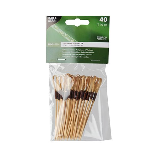 Priehľadné plastové balenie spoločnosti PAPSTAR GmbH obsahuje 40 Fingerfood-Picker "Loop" z bambusu s dĺžkou 10 cm - ideálne na občerstvenie a fingerfood. Ekologické pickery sú zviazané tmavou páskou a majú zeleno-biely štítok s detailmi značky.