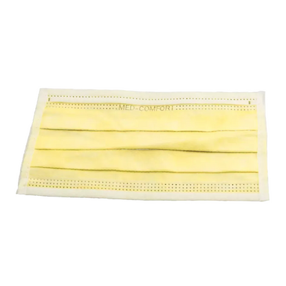 Jedna žltá jednorazová ochranná maska na ústa a nos s tromi záhybmi a bielymi slučkami na ušiach. Maska, AMPri MED-COMFORT OP maska na viazanie Typ IIR od AMPri Handelsgesellschaft mbH, má na vrchu vytlačený text „MED-COMFORT“.