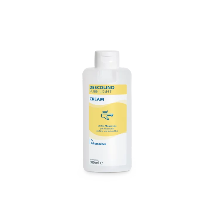 Biela 500 ml plastová fľaša Dr. Schumacher GmbH Descolind Pure Light Cream ošetrujúci krém, bez parfumácie pre citlivú pokožku, má žltý štítok s modrým písmom a je fotografovaná na jednoduchom bielom pozadí.