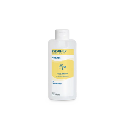 Biela 500 ml plastová fľaša Dr. Schumacher GmbH Descolind Pure Light Cream ošetrujúci krém, bez parfumácie pre citlivú pokožku, má žltý štítok s modrým písmom a je fotografovaná na jednoduchom bielom pozadí.