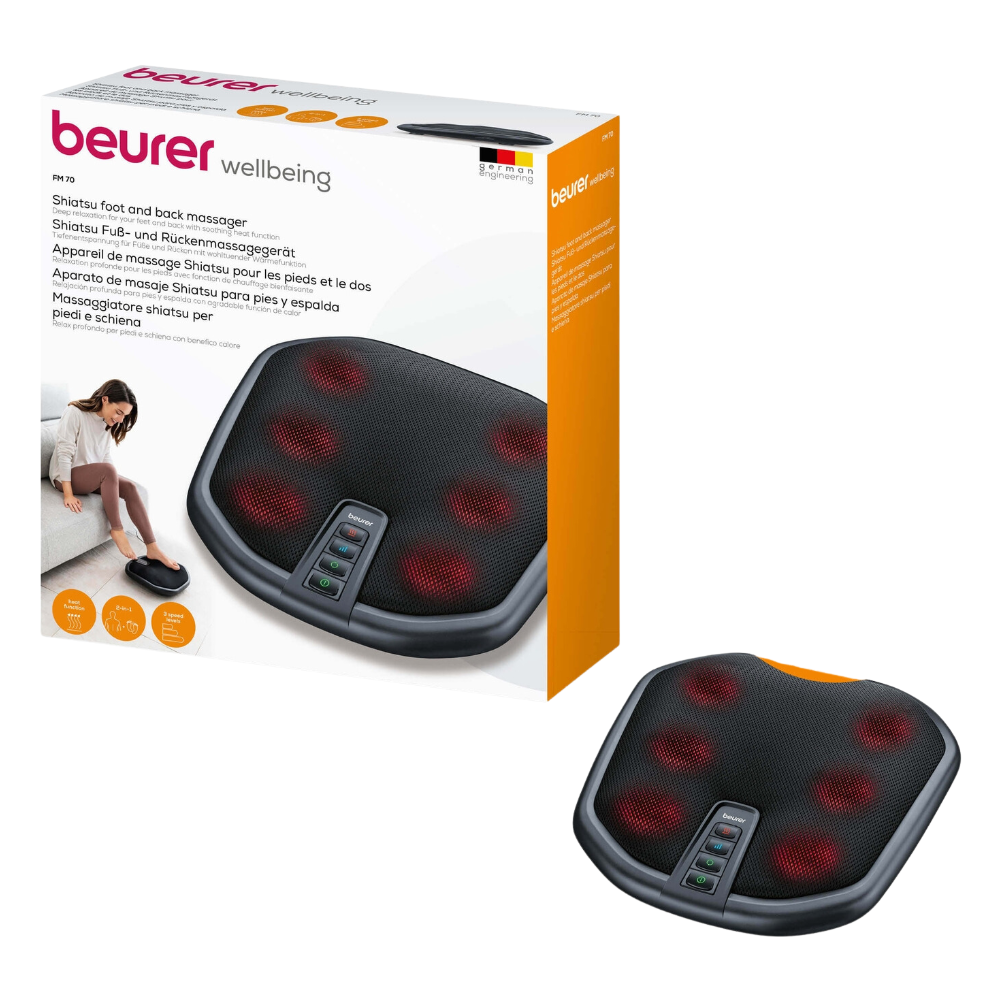 Obrázok zobrazuje Beurer FM 70 Shiatsu prístroj na masáž nôh a chrbta a zdôrazňuje jeho voliteľnú funkciu ohrevu. Čierne zariadenie má viditeľné červené masážne uzly a niekoľko ovládacích tlačidiel. Balenie obsahuje fotografiu osoby, ktorá si užíva masáž nôh a chrbta, ako aj podrobnosti o produkte v niekoľkých jazykoch.