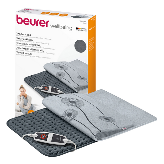 Abbildung des Beurer HK 125 XXL-Heizkissen Cosy Grey Sets. Das graue Heizkissen hat eine plüschige Oberfläche mit schlichtem Blumenmuster und verfügt über einen elektronischen Regler mit 6 Temperatureinstellungen. Auf der Verpackung sind der Markenname „Beurer GmbH“ und Produktdetails in mehreren Sprachen zu sehen, zertifiziert nach OEKO-TEX® STANDARD 100.