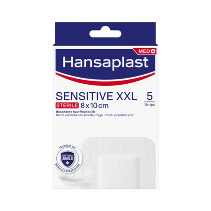 Krabička s Hansaplast Sensitive XL, sterilné, obzvlášť šetrné k pokožke, sterilné pásiky s rozmermi 8x10 cm. Krabička obsahuje 5 pásikov a vyniká vlastnosťami ako šetrnosť k pokožke a vysoká savosť. Balenie tiež nesie označenie „Bacterial Shield“ a zaručuje tak prvotriedne ošetrenie rán od Beiersdorf AG.