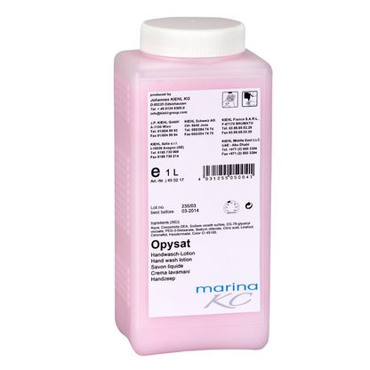 Vzpriamene stojí pravouhlá ružová plastová fľaša s nápisom "Kiehl Opysat Handwasch-Lotion" od Johannes Kiehl KG. 1-litrové, pH-neutrálne mydlo na ruky je ideálne na jemné čistenie rúk, s pokynmi na použitie a detailmi na etikete.