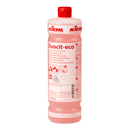 1-litrová fľaša Kiehl Duocit-eco Sanitárneho čističa s pomarančovou sviežosťou od Johannes Kiehl KG má červený uzáver a etiketu s viacjazyčnými informáciami. Fľaša obsahuje ružovú tekutinu na ekologické čistenie a zanecháva sviežu pomarančovú vôňu.