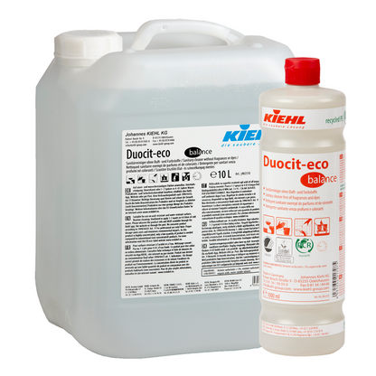 Ein 10L durchsichtiger Kanister und eine 1L weiße Flasche Kiehl Duocit-eco balance Sanitärreiniger ohne Duft- und Farbstoffe der Johannes Kiehl KG, beide mit rotem Deckel und mit Anwendungs- und Sicherheitshinweisen beschriftet.