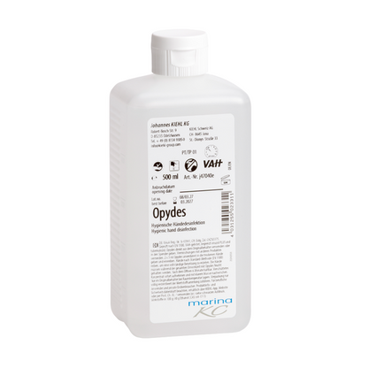 Biela 500-ml plastová fľaša Kiehl Opydes Hygienická dezinfekcia rúk od Johannes Kiehl KG s bielym uzáverom a štítkom s návodom na použitie, dávkovacími údajmi, informáciami o výrobcovi a certifikačnými logami.