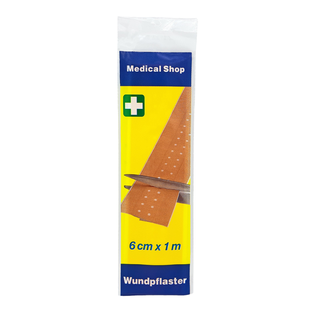 Zobrazené je balenie náplastí na rany „Medical Shop“ od Holthaus Medical GmbH & Co. KG, 6 cm x 1 m, pevný obal. Na balení je zobrazené nožnice, ktoré strihajú pásik náplasti „pevný“. Dizajn je modrý a žltý, so zeleným krížovým symbolom a nápisom „6 cm x 1 m“. Perfektné pre efektívnu starostlivosť o rany.