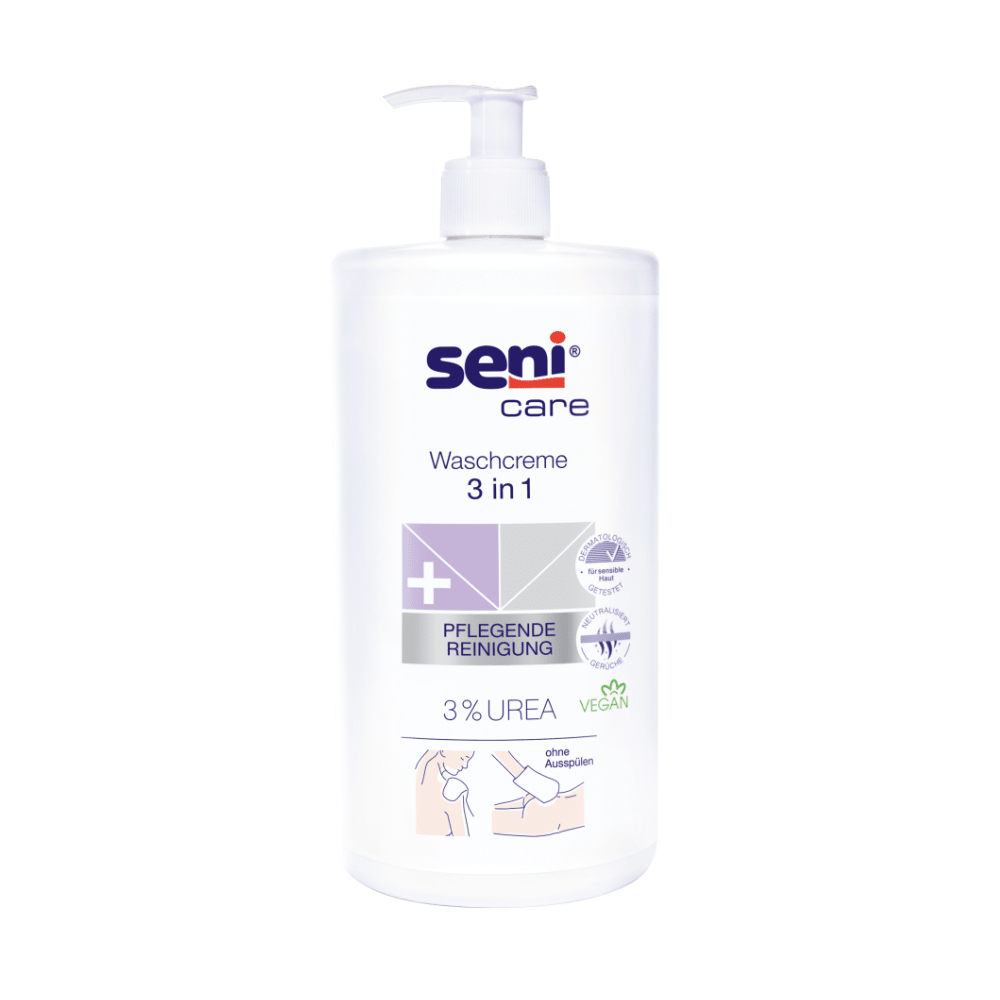Biela pumpičková fľaša TZMO Deutschland GmbH Seni Care umývací krém 3 v 1 s 3% močoviny, 1000 ml, s nápisom vegan. Nemecký text zdôrazňuje jemné, ošetrujúce čistenie - ideálne pre potreby citlivej pokožky.