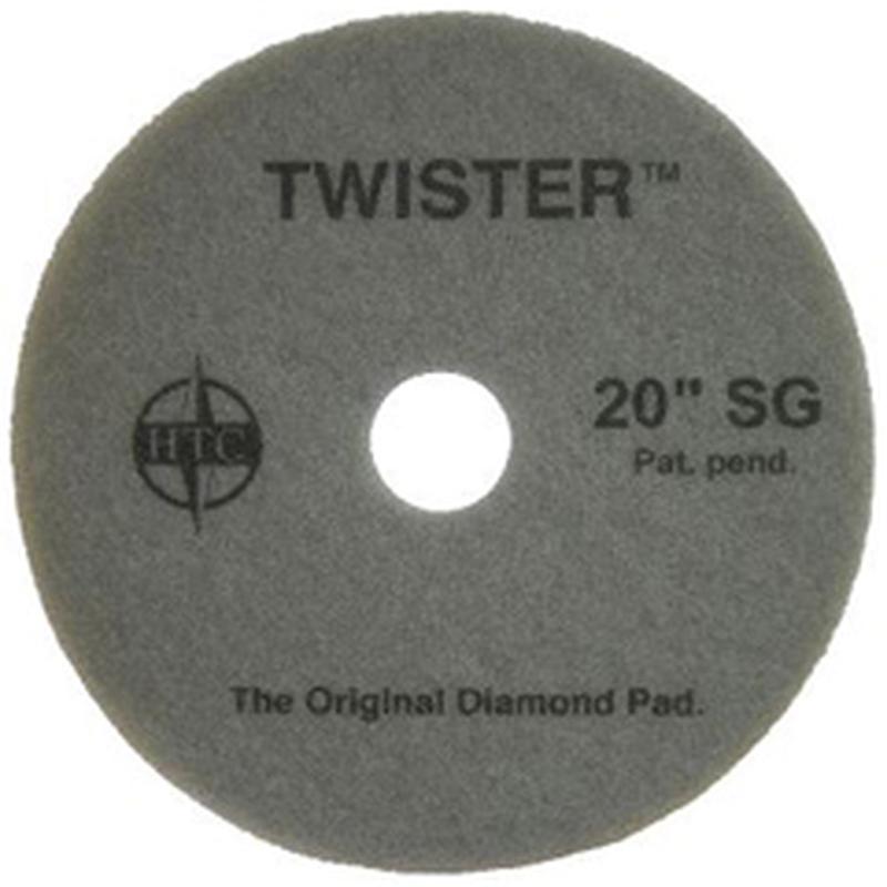 Twister Pad 10000 od Diversey Deutschland GmbH & Co. OHG je okrúhla, sivá podložka s centrálnym otvorom a nápisom "TWISTER 20'' SG - The Original Diamond Pad". Ideálne na čistenie a leštenie tvrdých podláh.