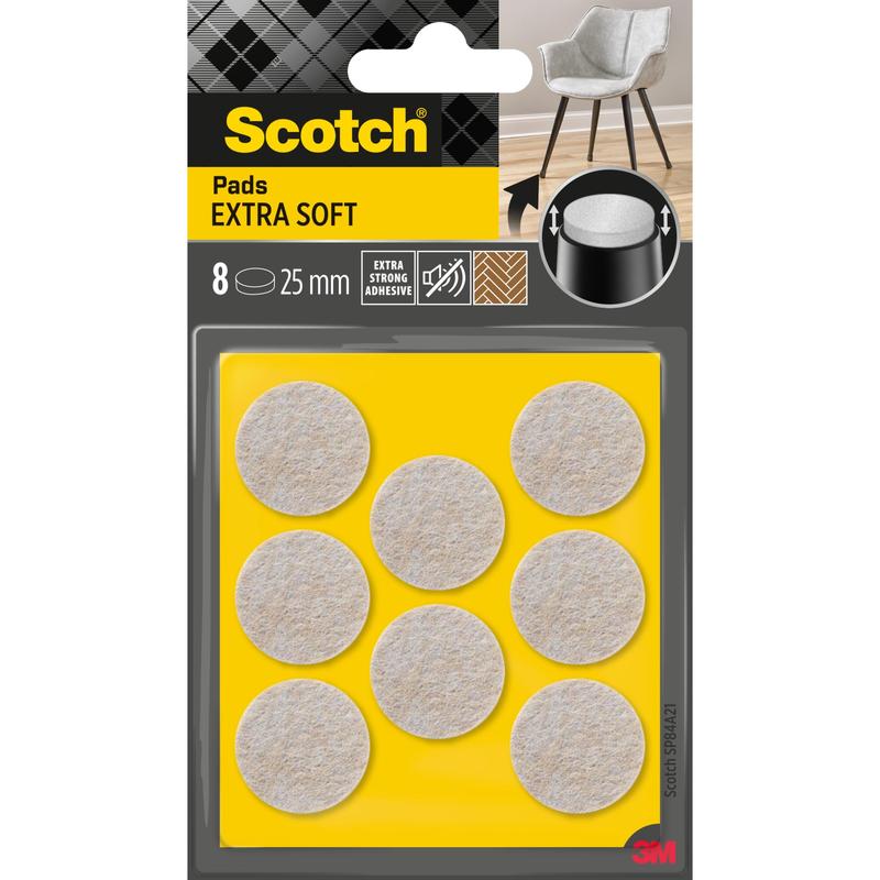 Balenie 3M Scotch® Extra mäkkých filcových podložiek, samolepiace, béžové, obsahuje 8 okrúhlych podložiek (každá 25 mm) na žltom obale. Balenie má extra silné lepidlo a je navrhnuté na použitie na nábytku.