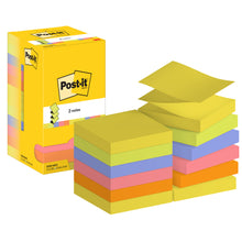 Eine Schachtel Post-it® Super Sticky Z-Notes der 3M Deutschland GmbH (76 mm x 127 mm, 100 Blatt/Block, Kartonverpackung, 100% PEFC) wird neben Stapeln von quadratischen Zetteln in Gelb, Blau, Orange, Pink und Lila gezeigt, wobei ein gelber Zettel angehoben wird.